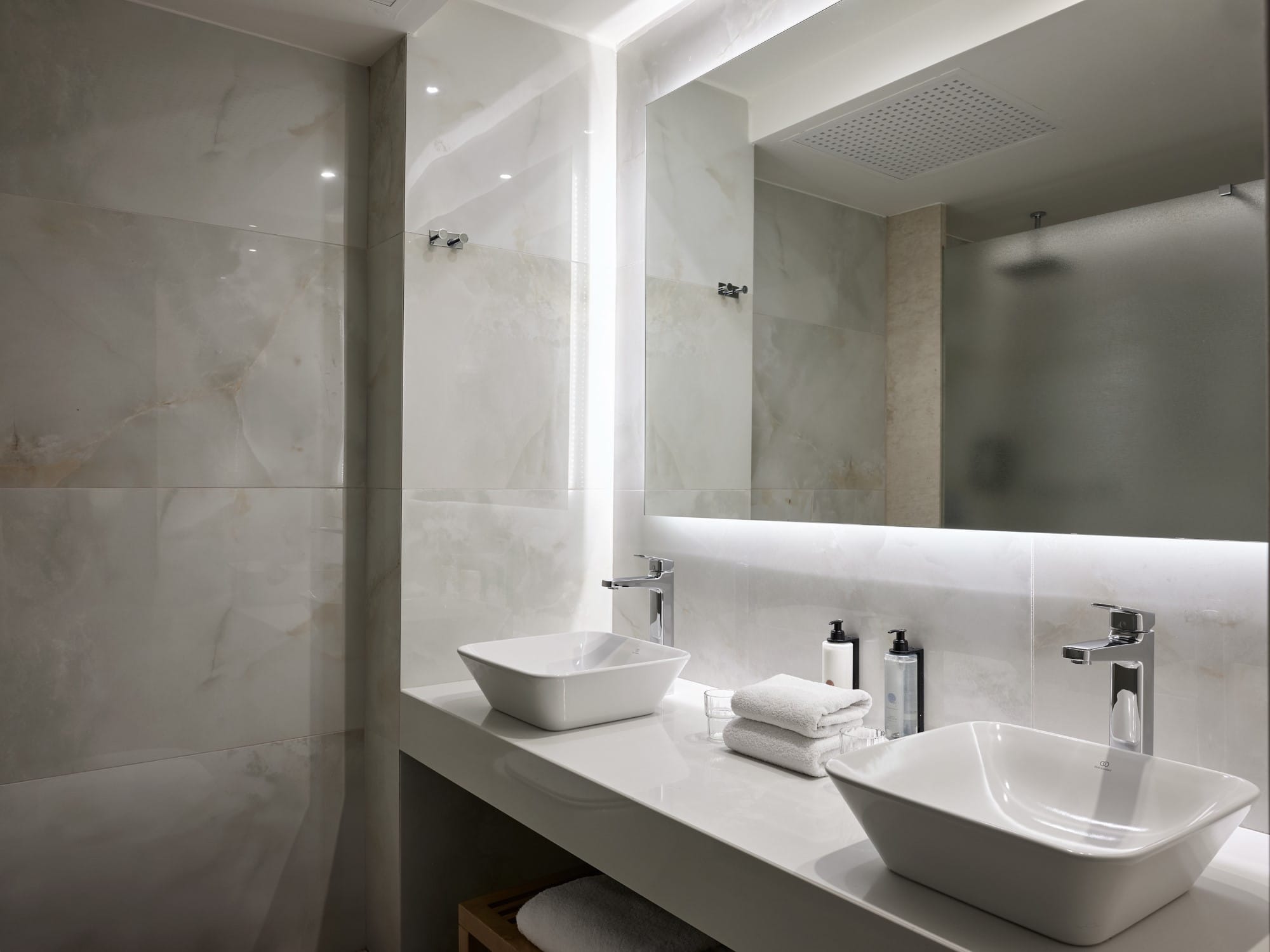 a bathroom with a glass shower