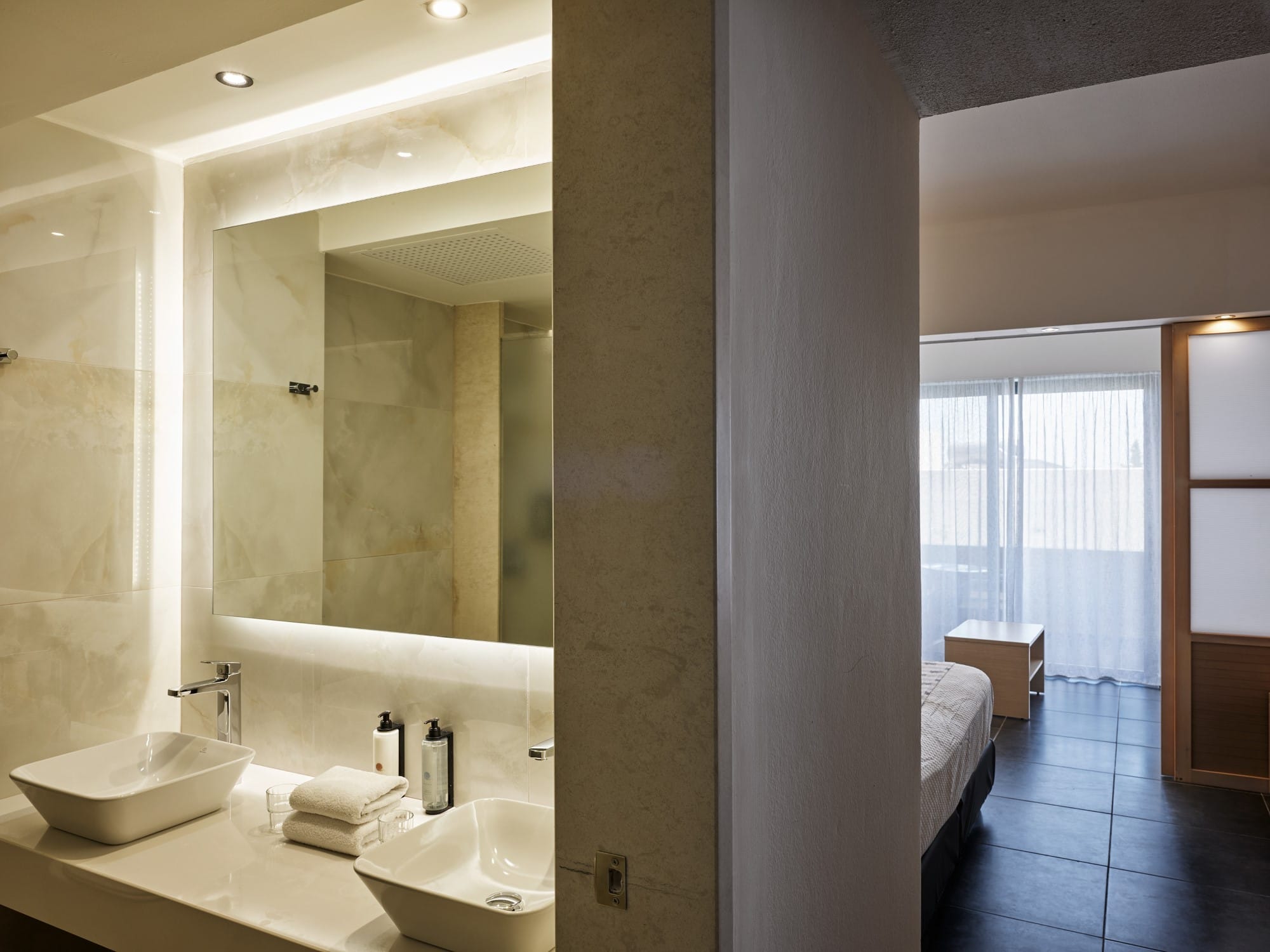 a bathroom with a large mirror