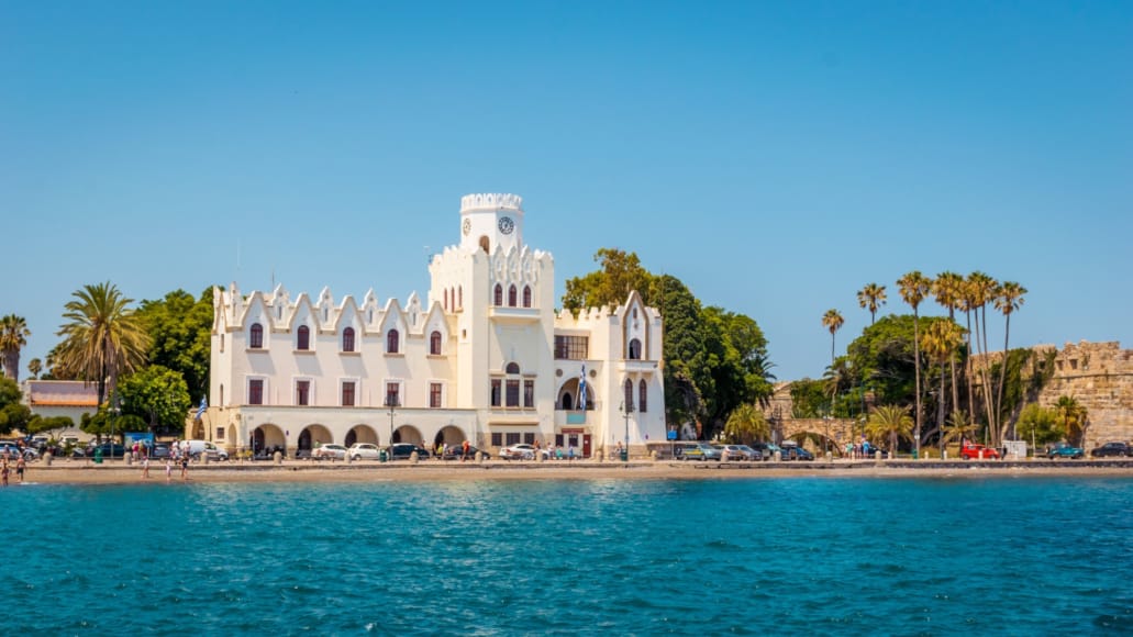 a white building on a beach