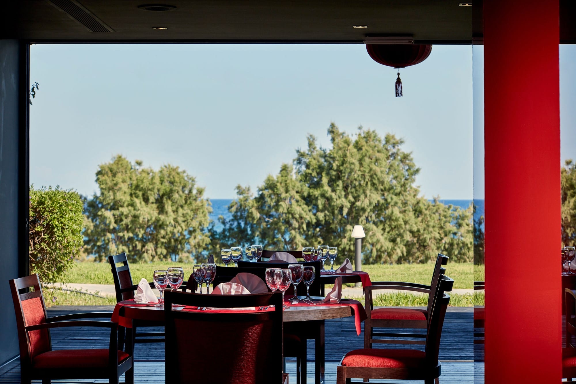 a table with chairs and a window