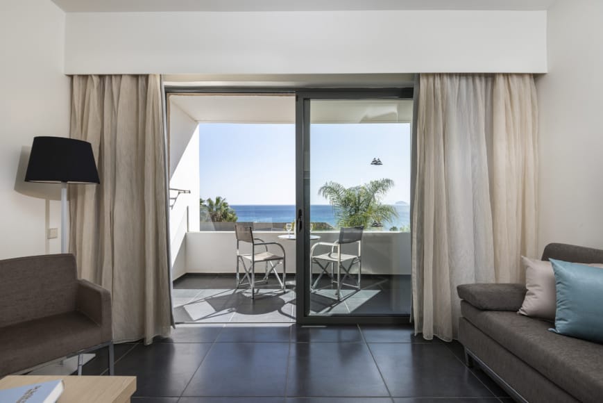 a living room with a large glass door