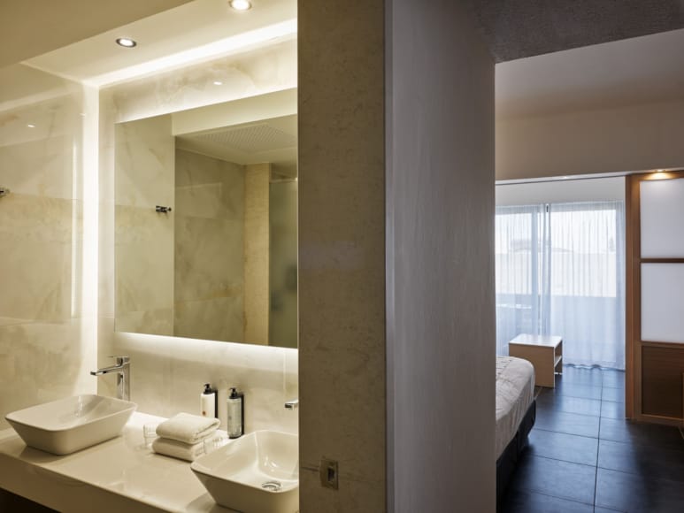 a bathroom with a large mirror