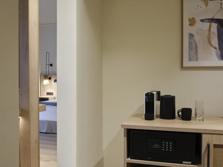 a kitchen with a microwave oven and coffee maker