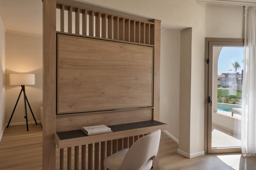 a room with a desk and a chair