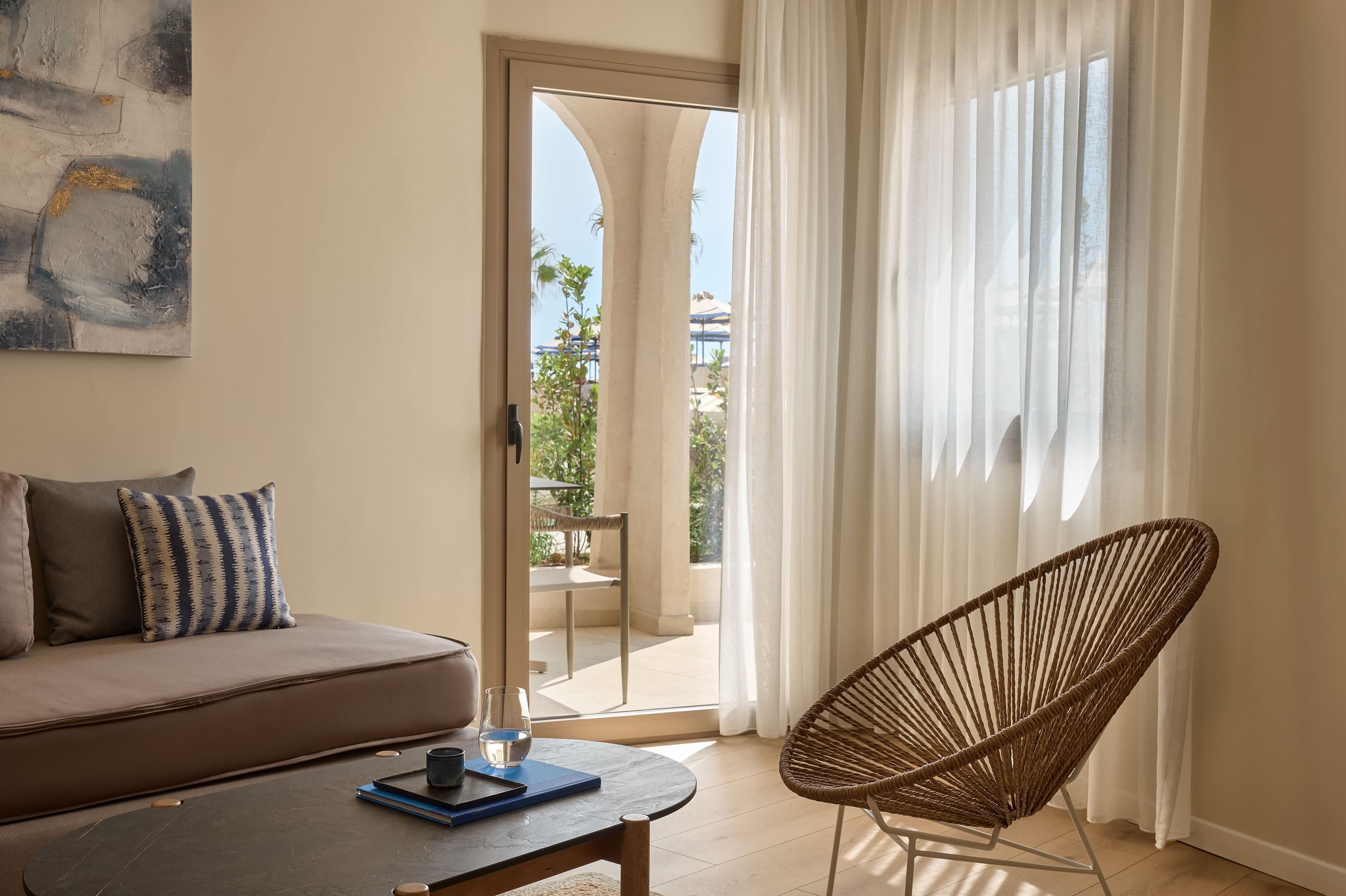 a living room with a chair and a table