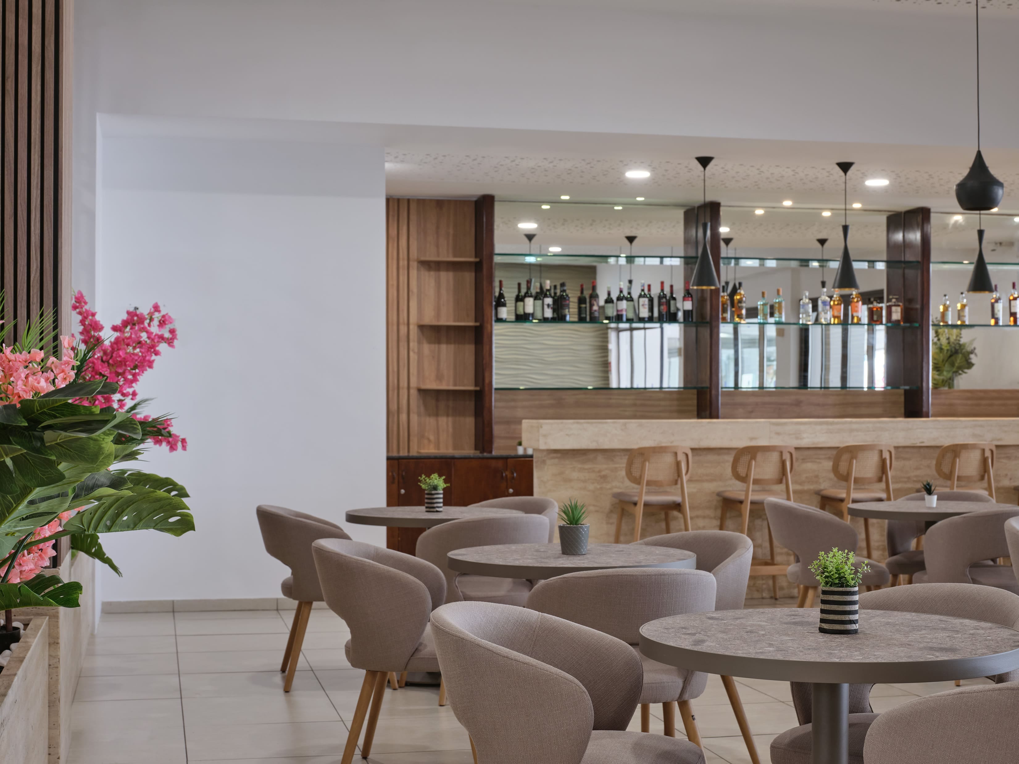 a room with tables and chairs