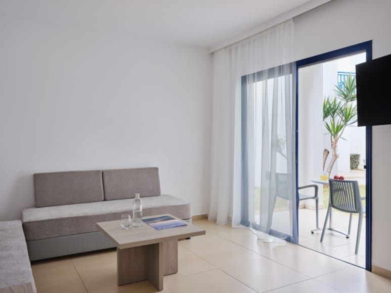 a living room with a couch and a table