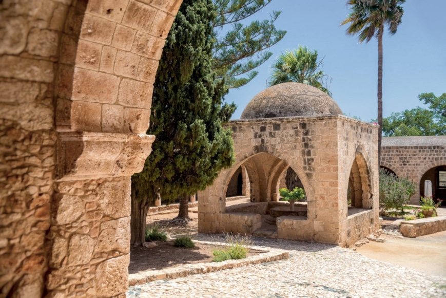 a stone archway with a dome