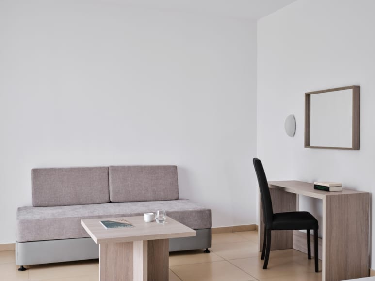 a living room with a couch and table