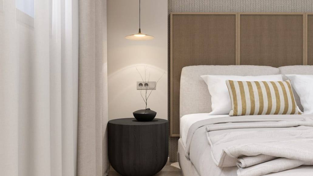 a bed with a lamp on it