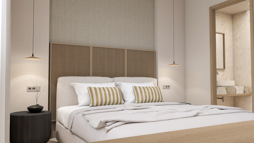 a bed with white sheets