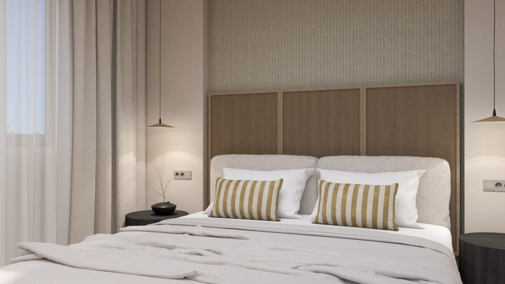 a bed with white sheets