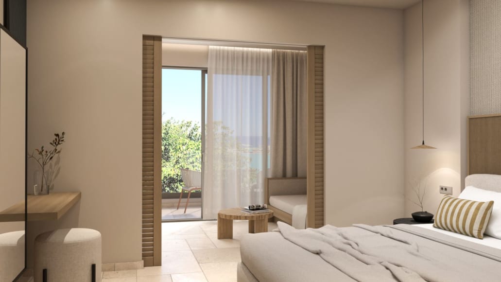 a bedroom with a large window