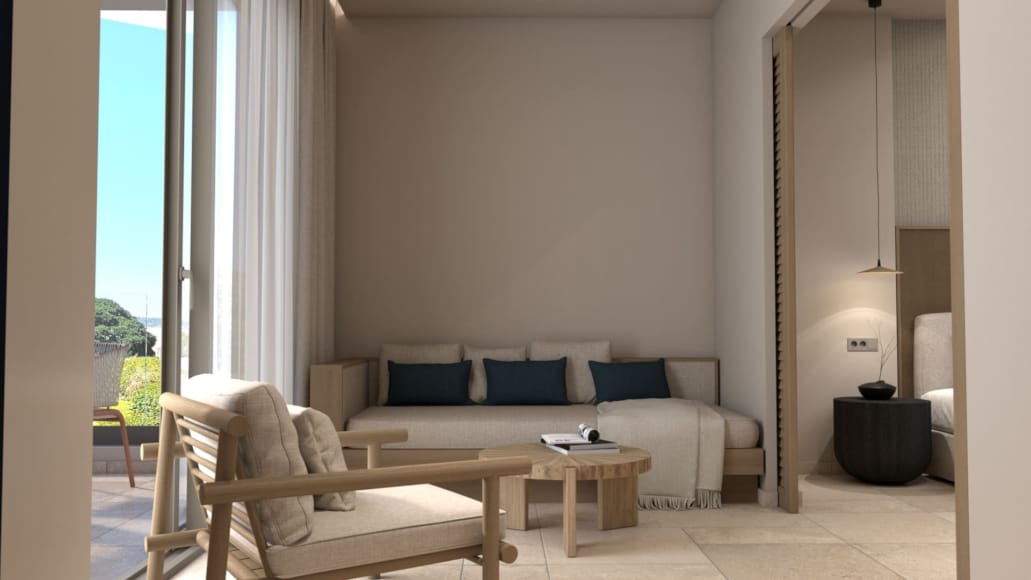 a living room with a couch and chairs