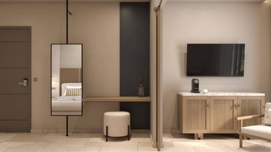 a room with a tv and a desk