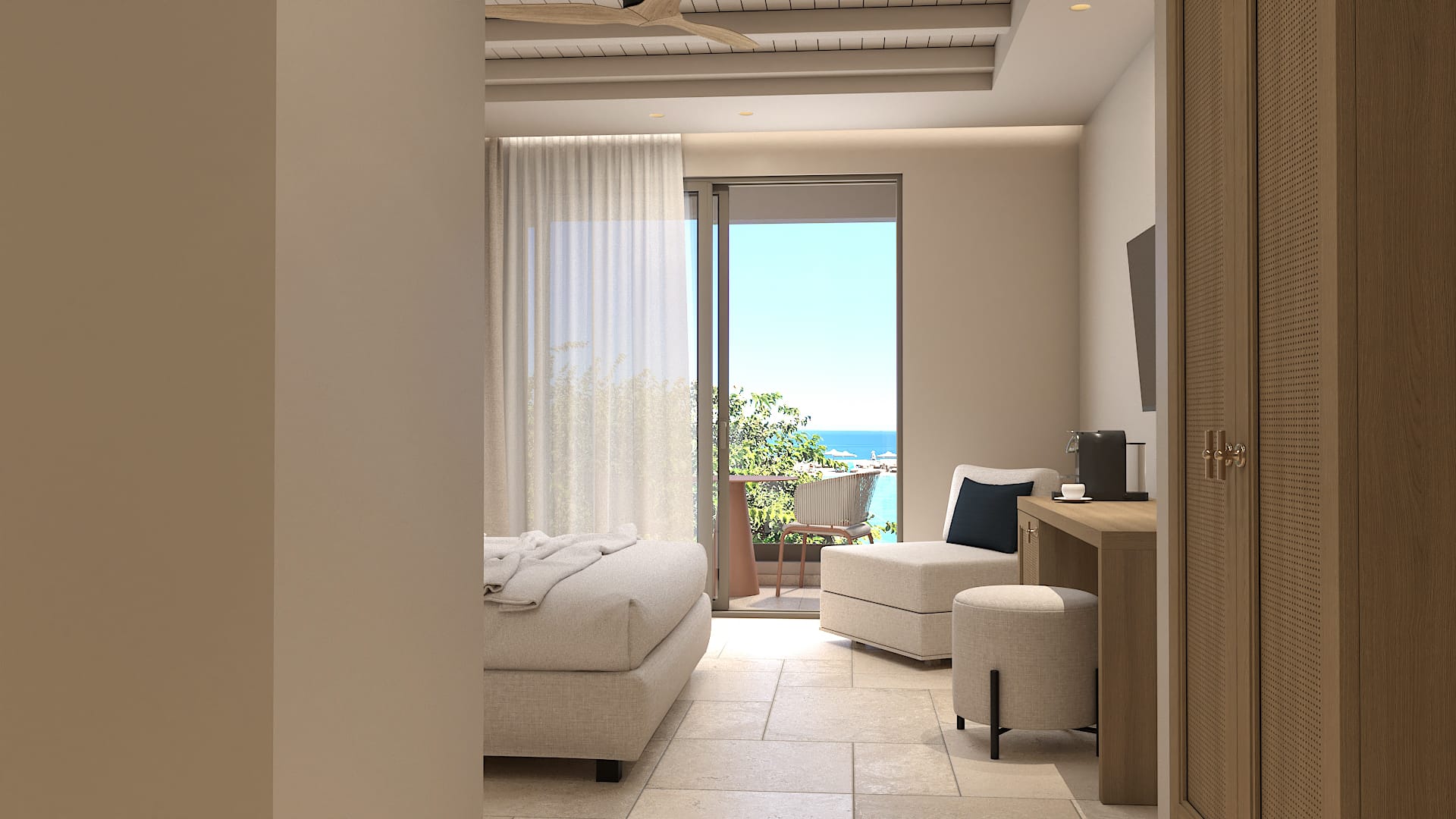 a room with white couches and a window