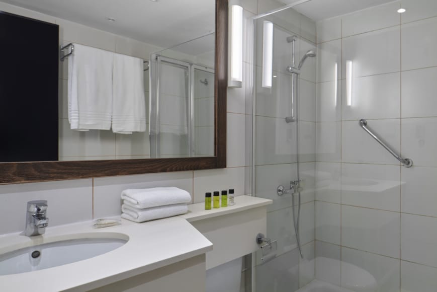 a bathroom with a glass shower