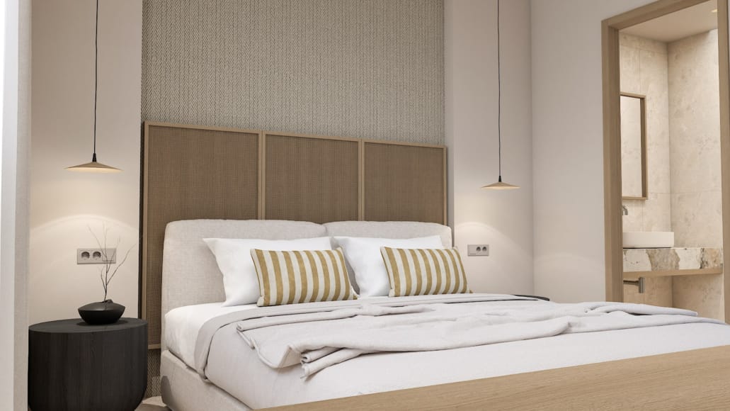 a bed with white sheets