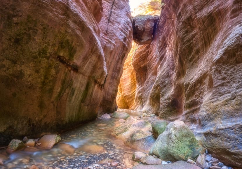 a river flowing between large rocks