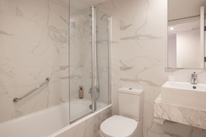 a bathroom with a glass shower