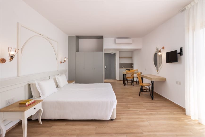 a room with a bed and a table
