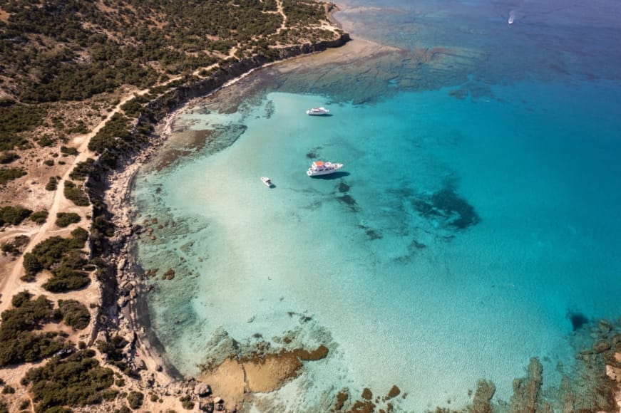 a beach with boats