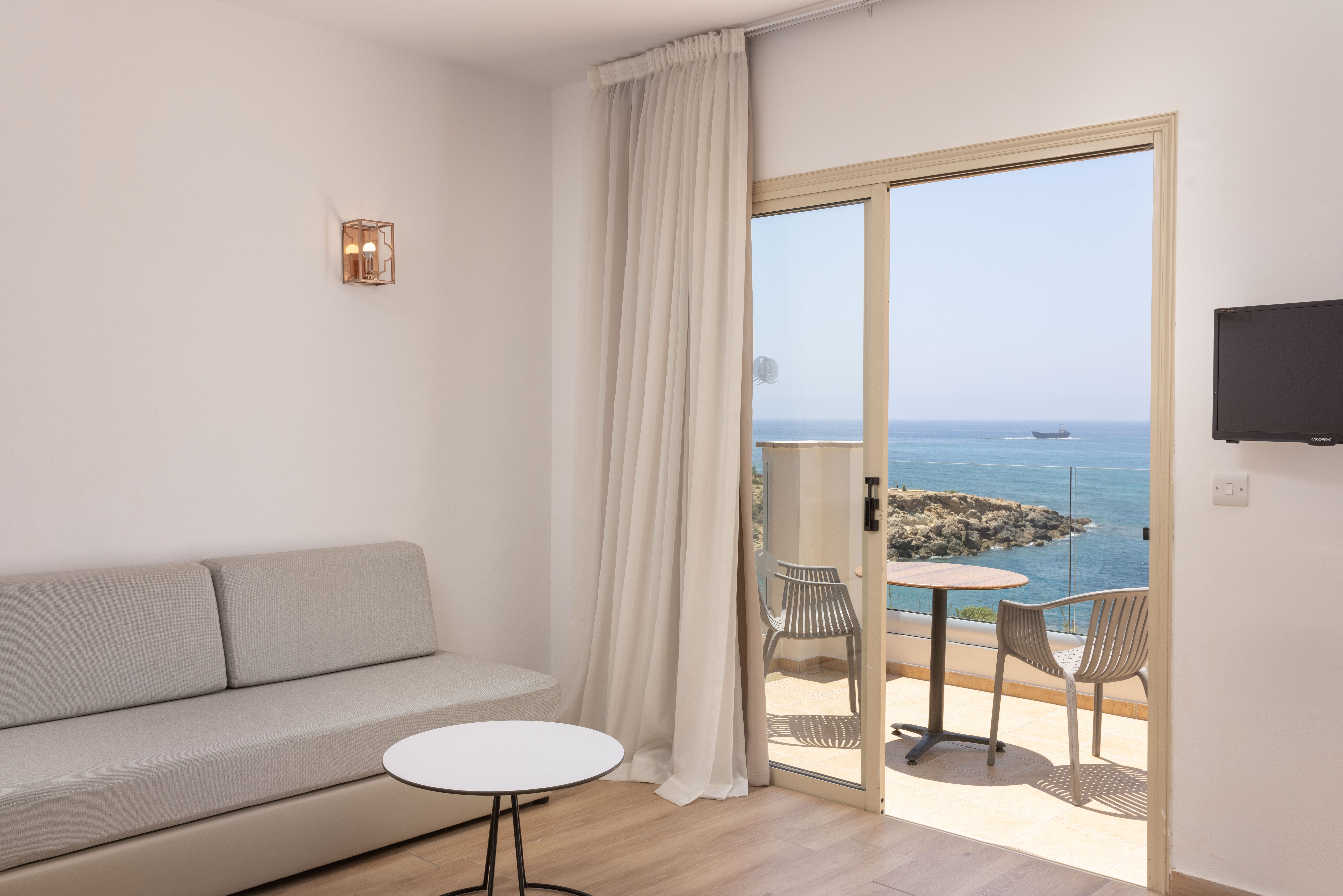 a room with a table and chairs