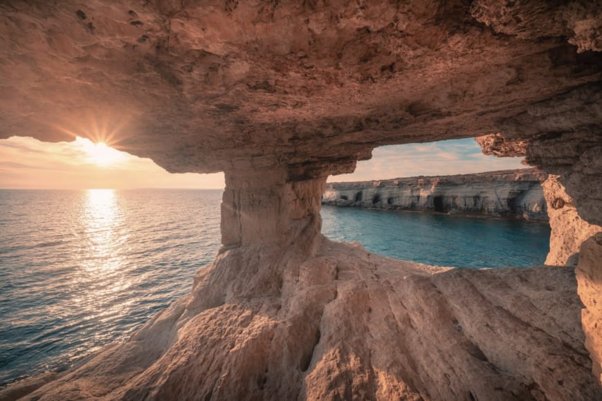 a cave with a body of water in it