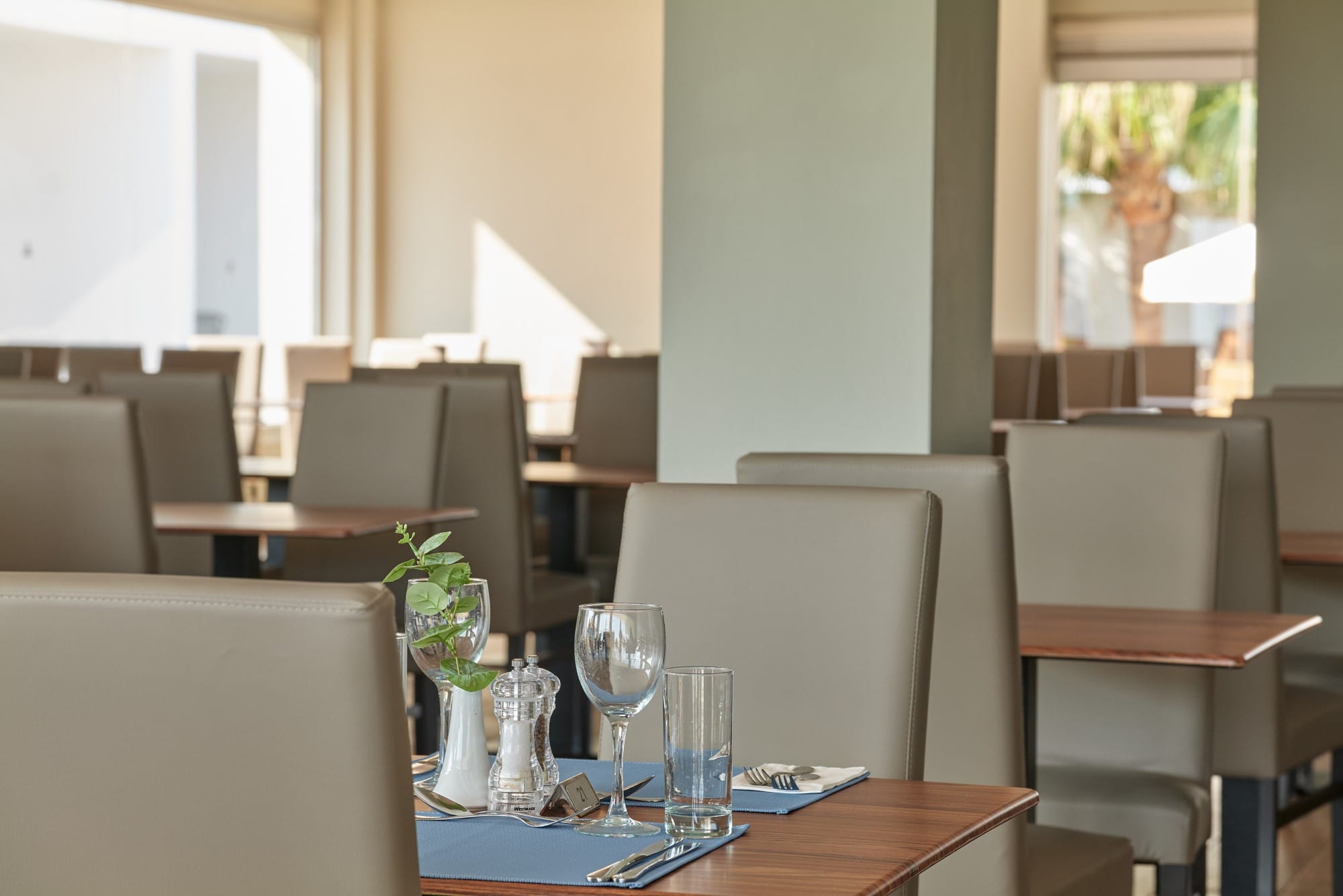 a room with chairs and tables