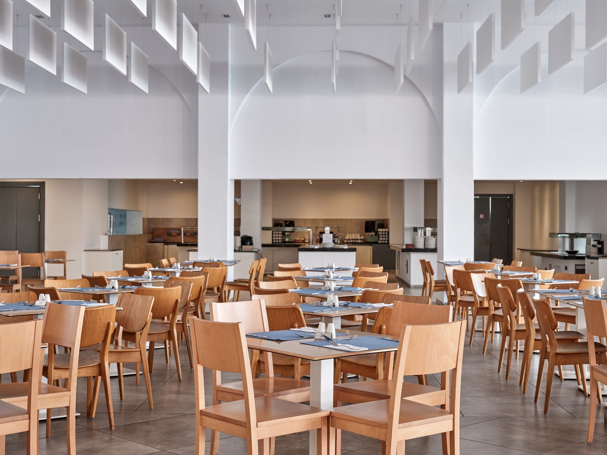 a room with tables and chairs