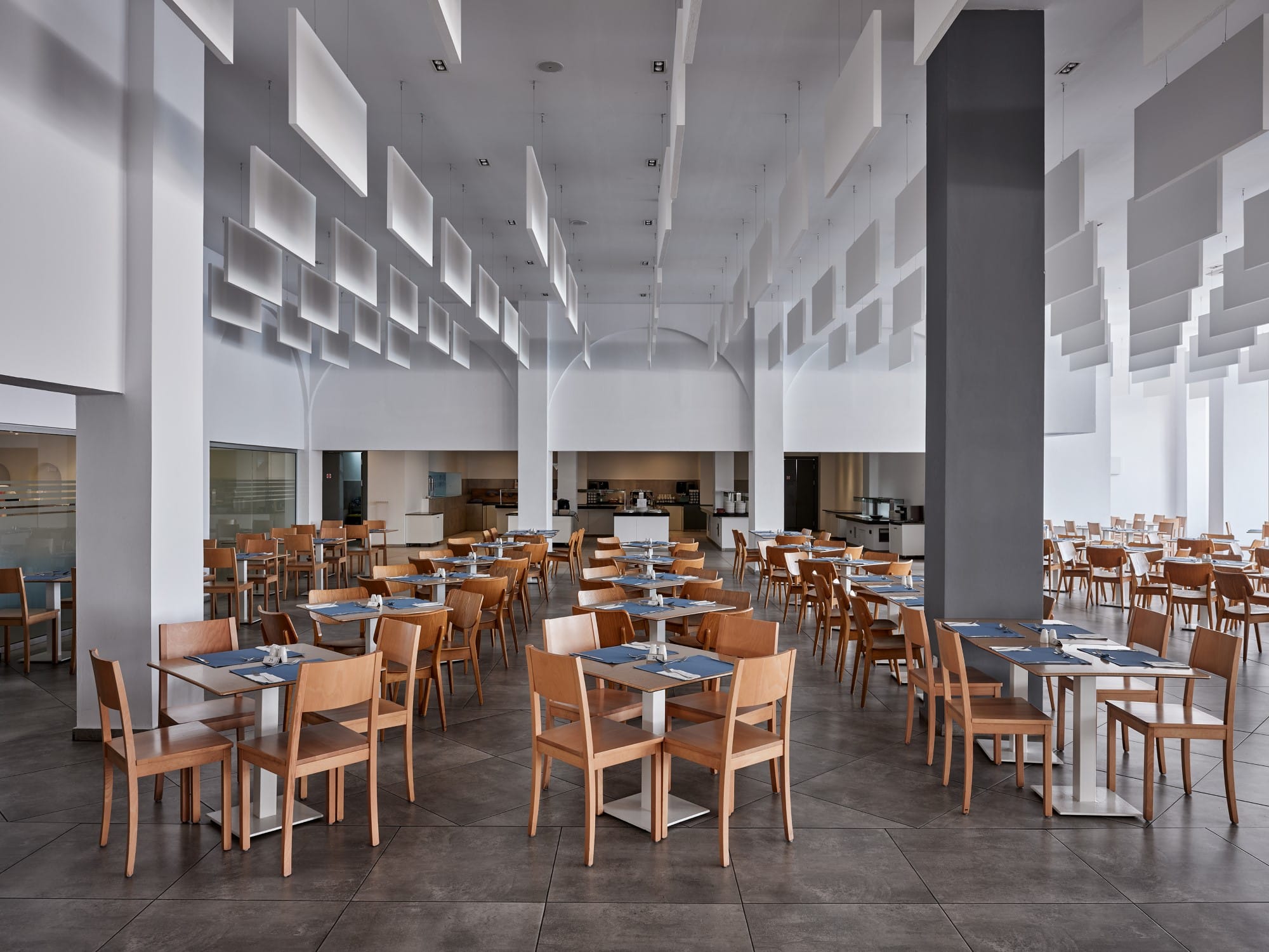 a room with tables and chairs