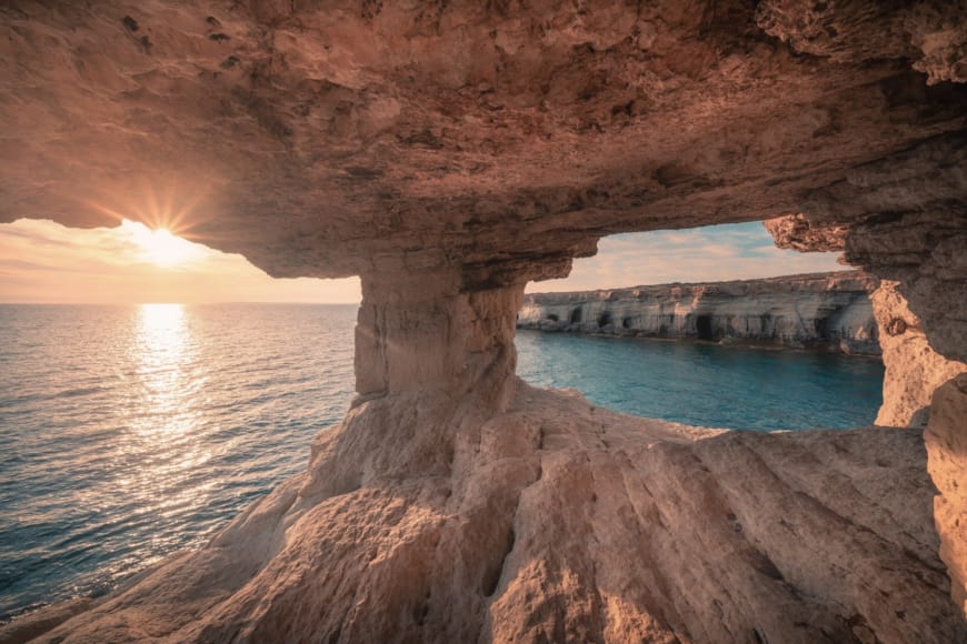 a cave with a body of water in it