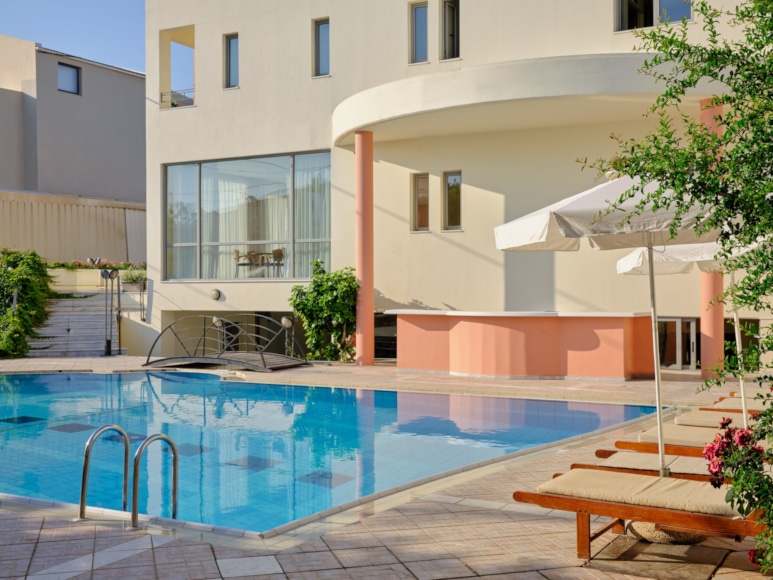 a swimming pool outside a building