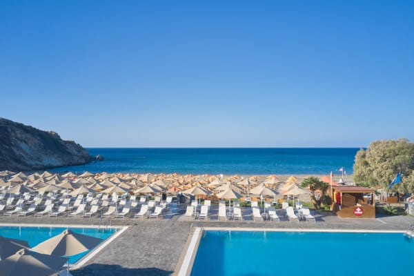 a pool next to a beach