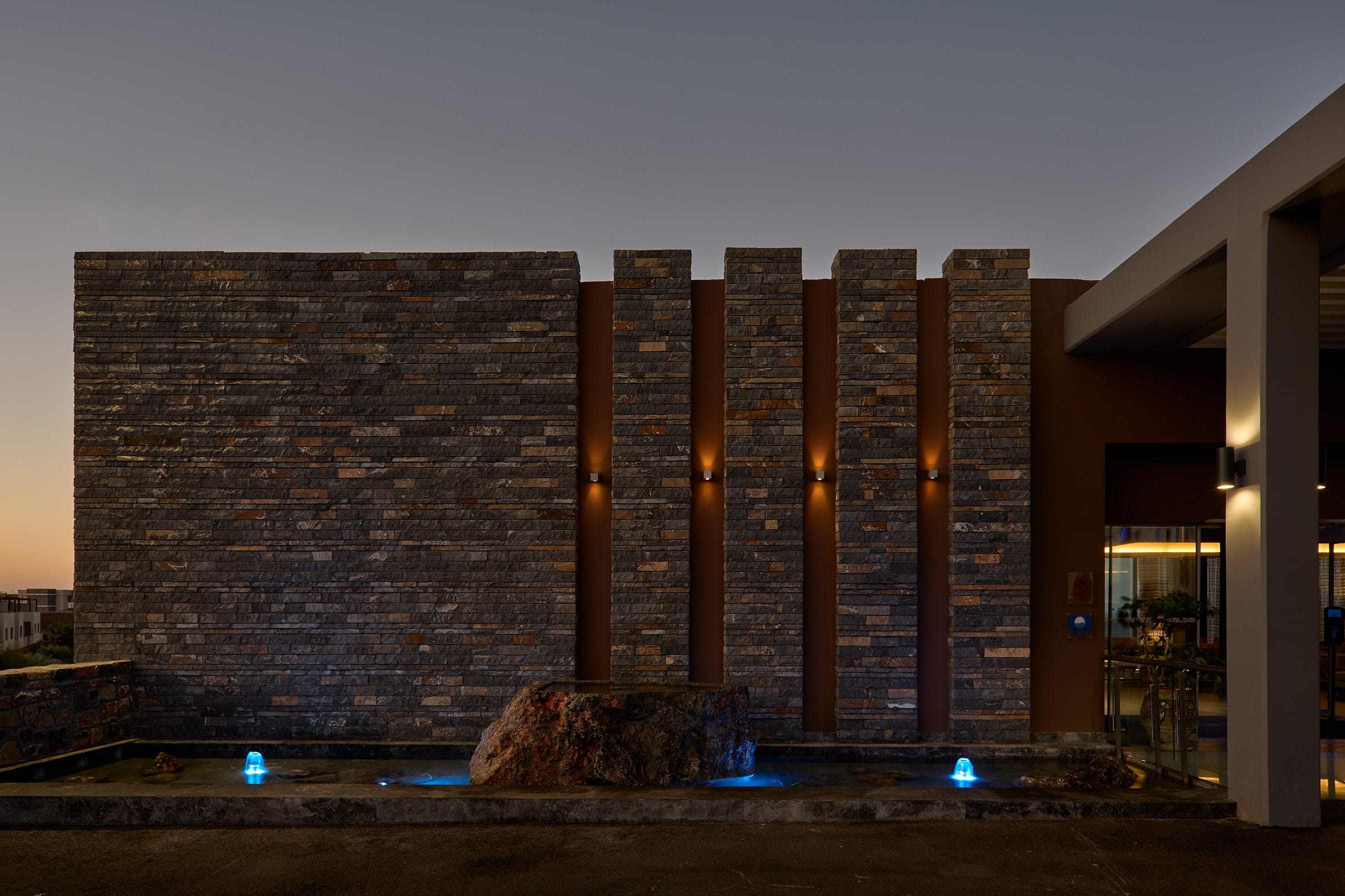 a building with a large stone wall