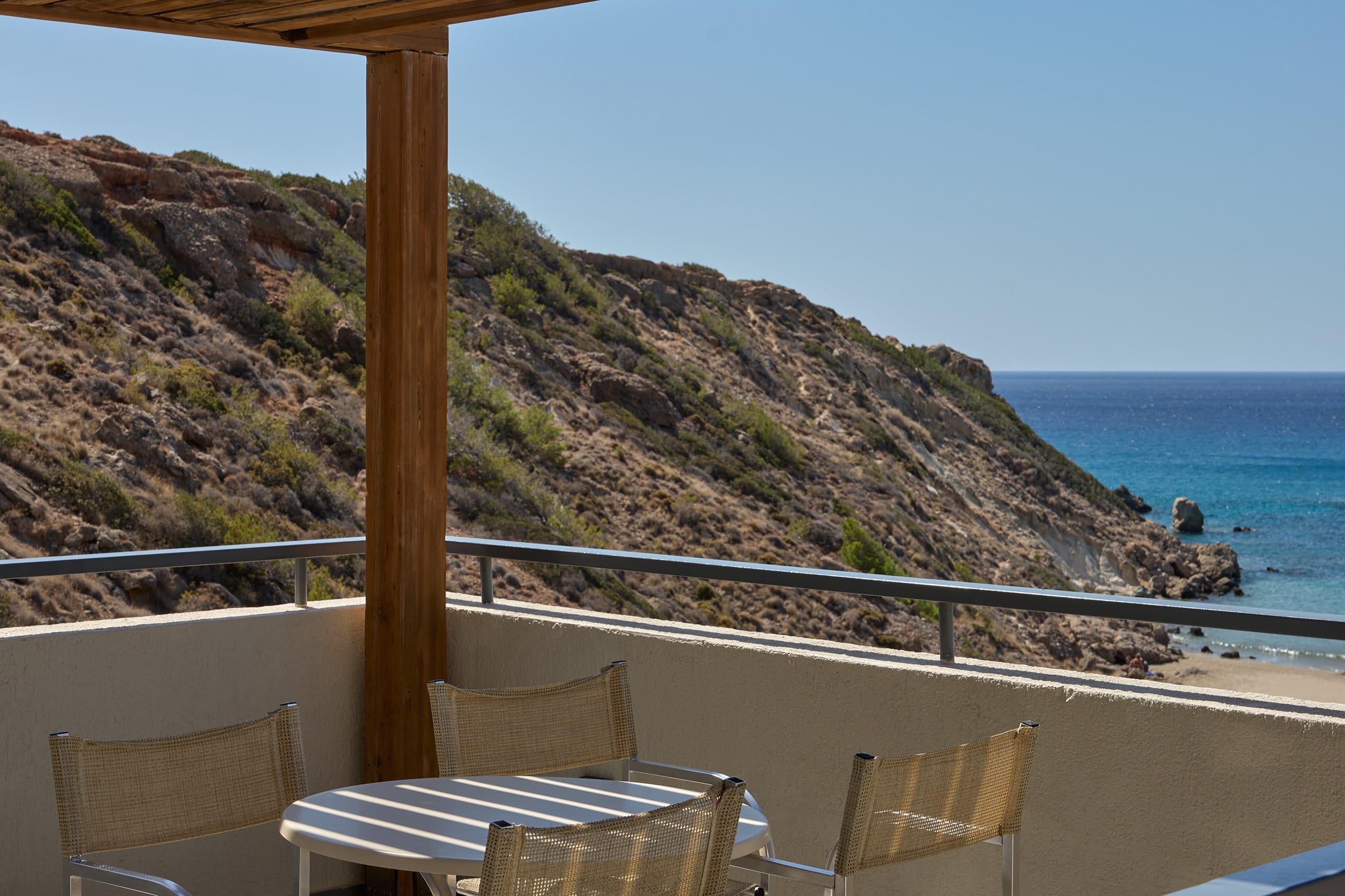 a balcony overlooking a beach