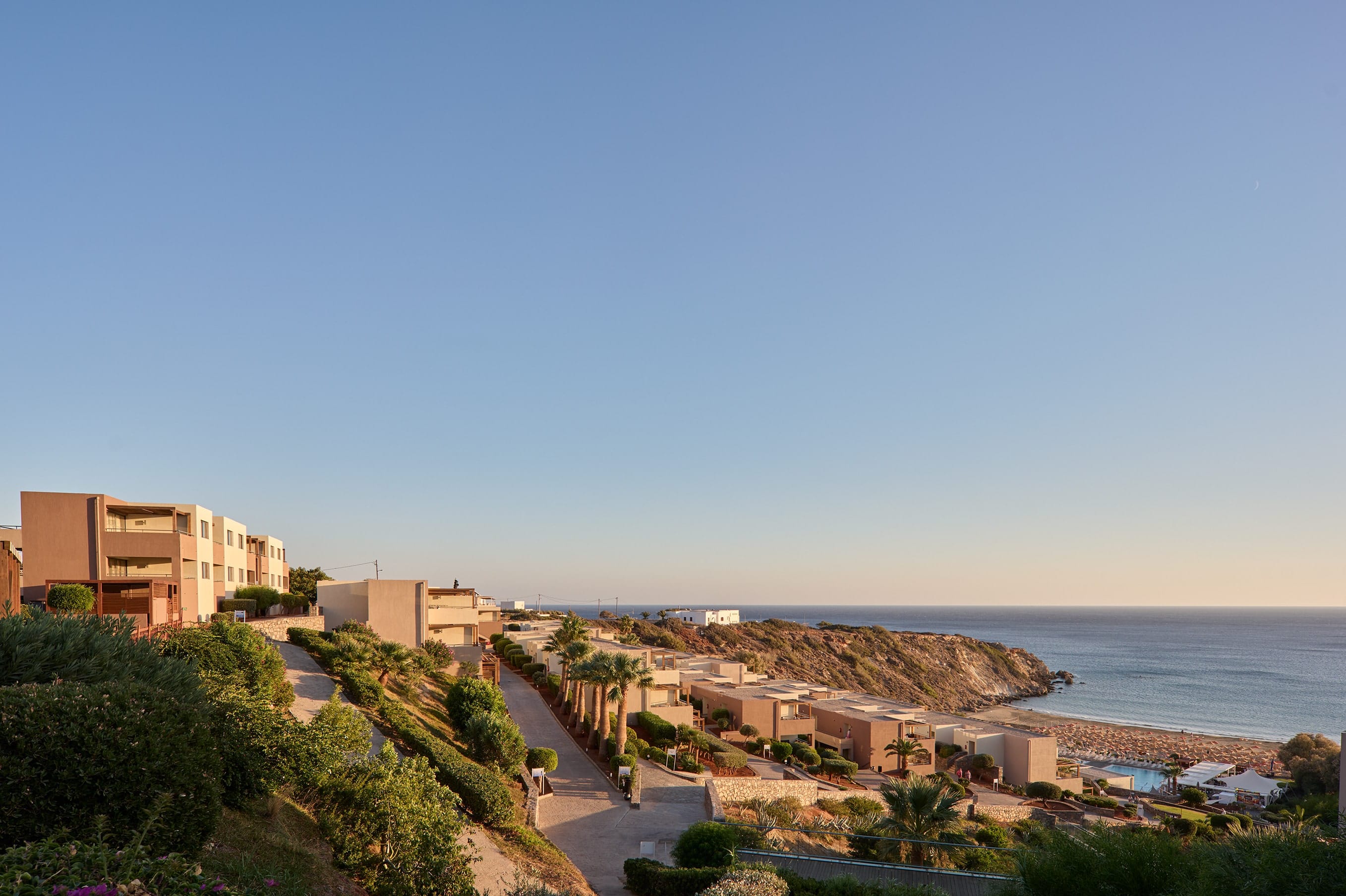 a road next to a beach