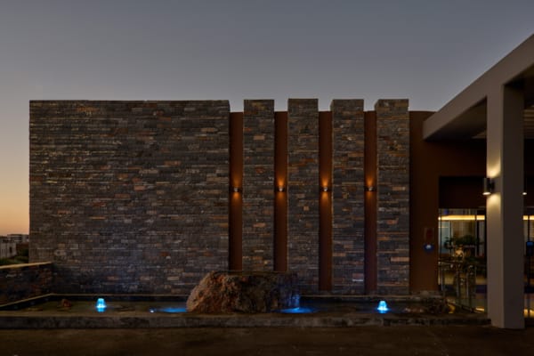 a building with a large stone wall