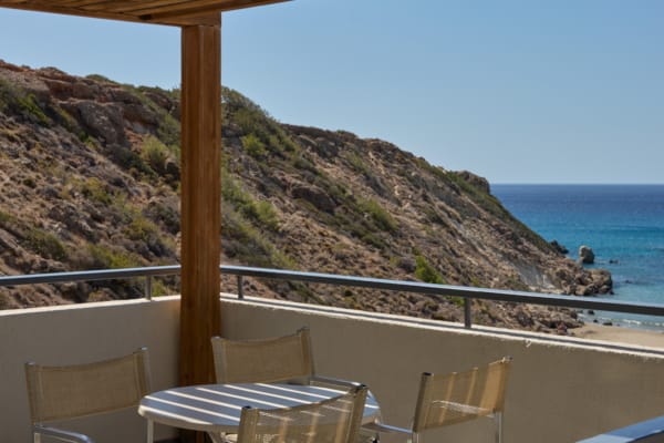 a balcony overlooking a beach