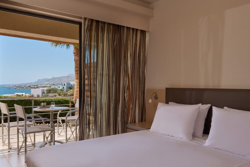 a hotel room with a large window