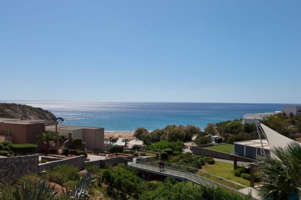 a view of a town and the ocean