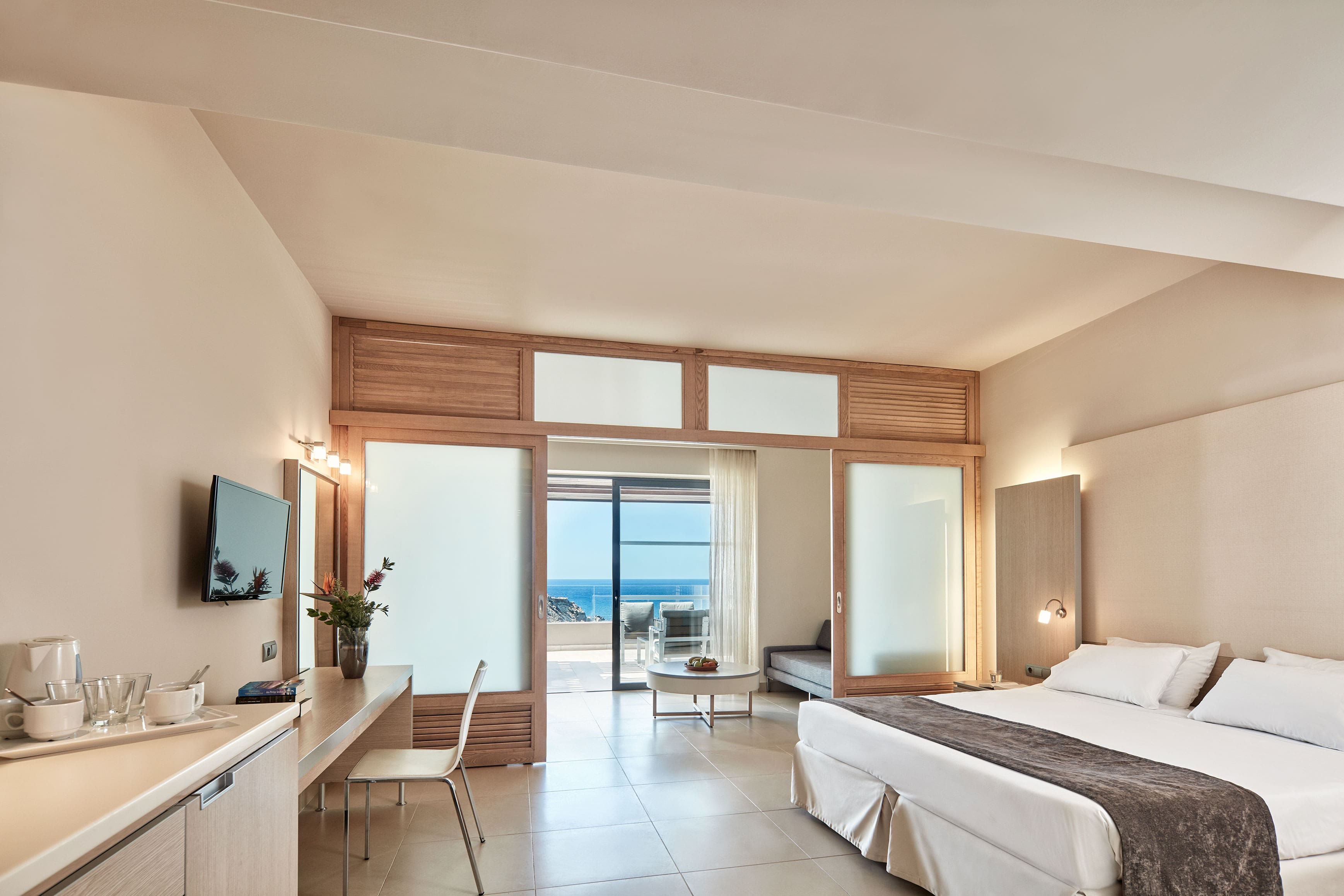 a large bedroom with a large window