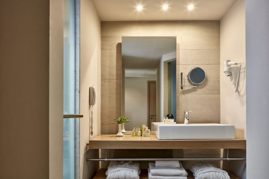 a bathroom with a large mirror