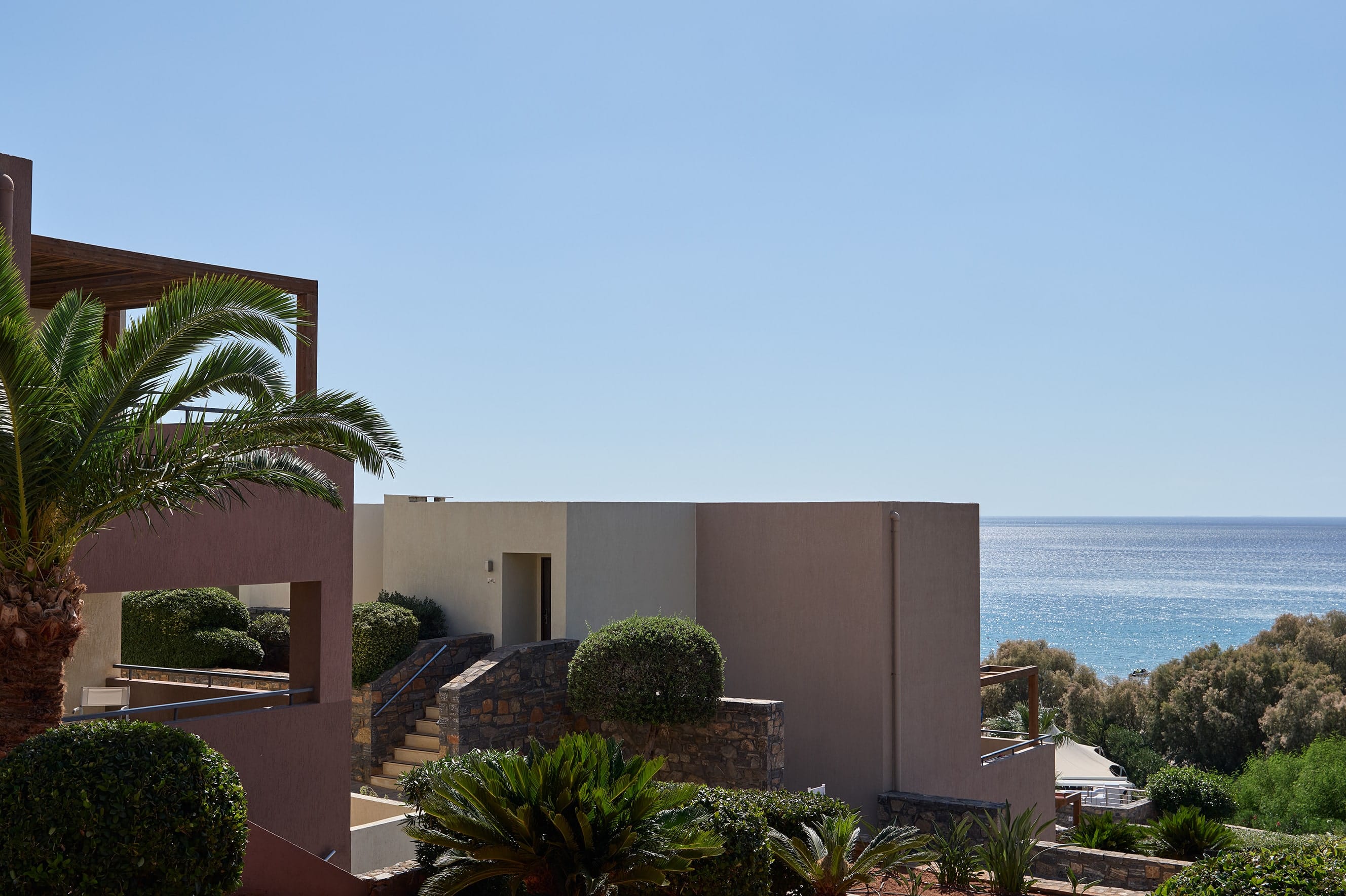a house with a large body of water in the background