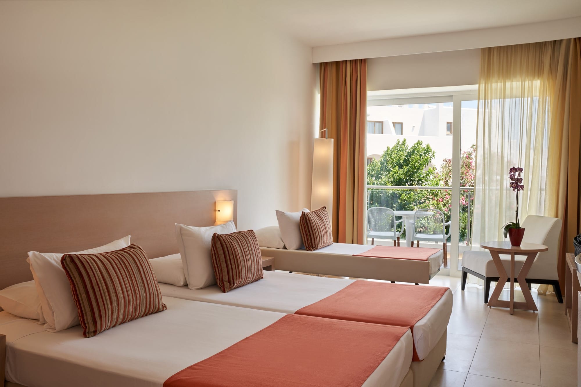 a hotel room with a large window