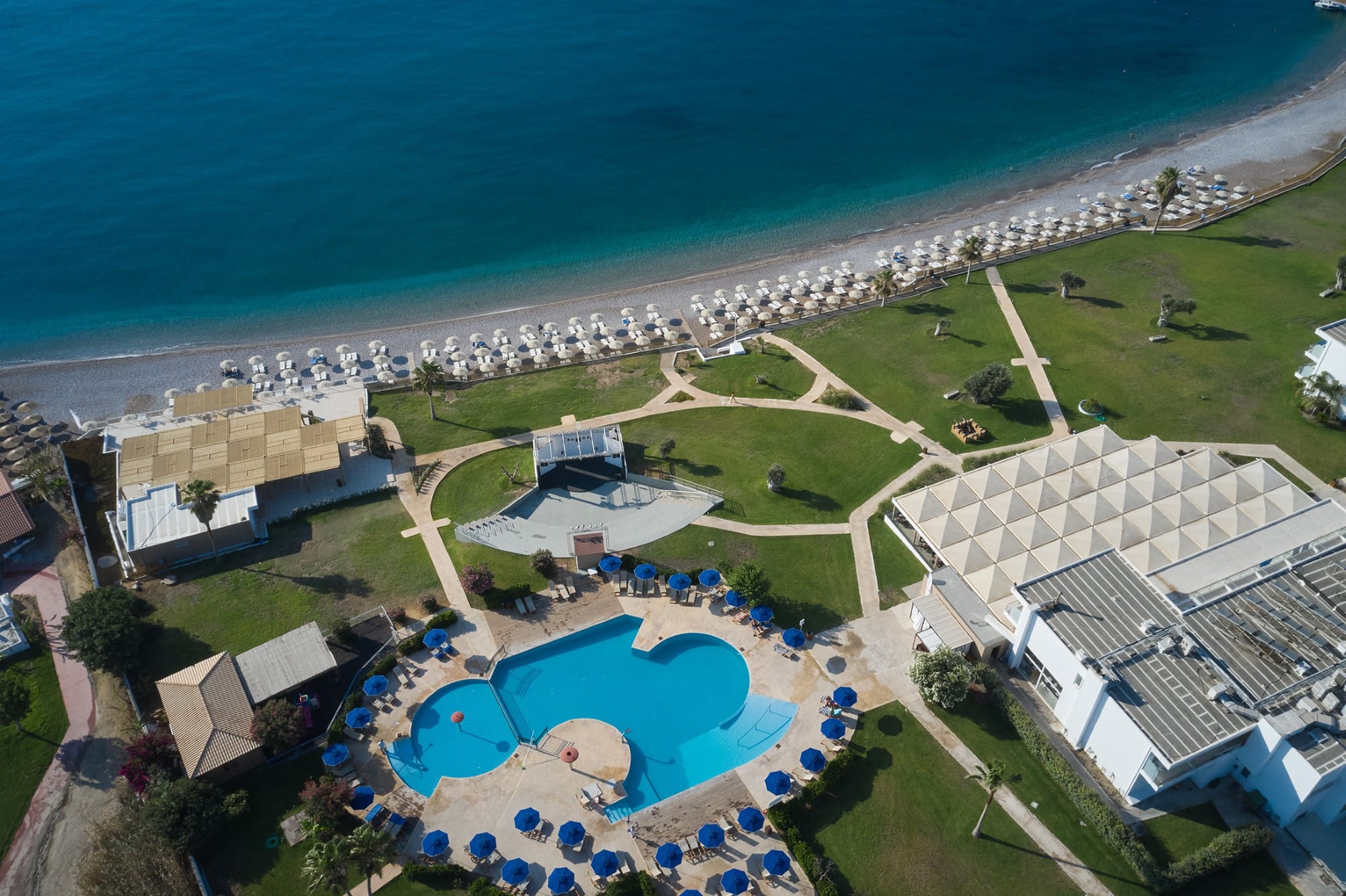 a pool next to a beach