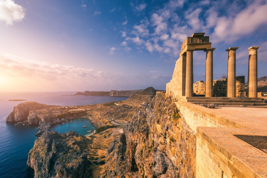 a stone building on a cliff