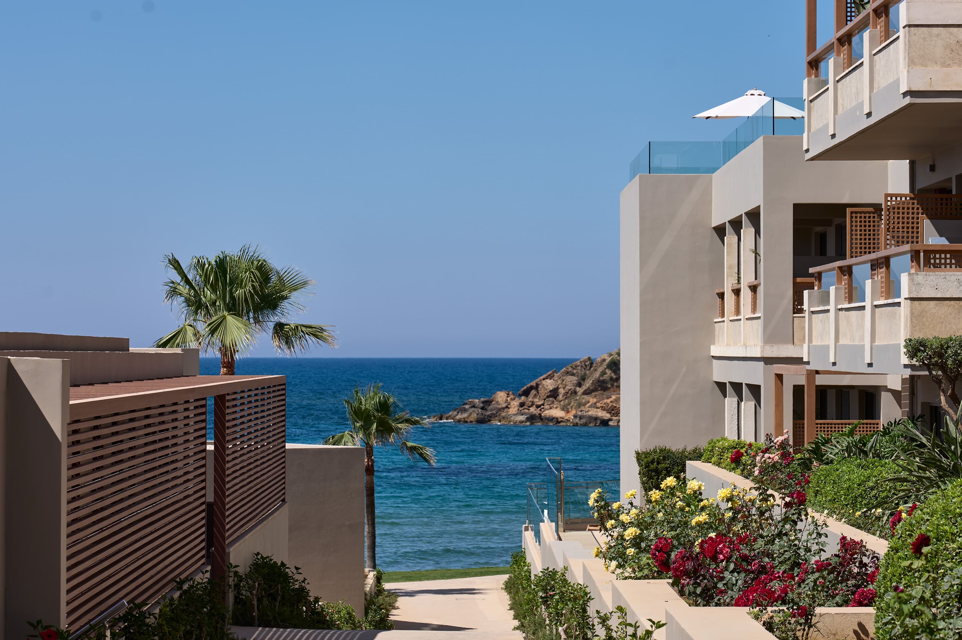 a building next to a body of water