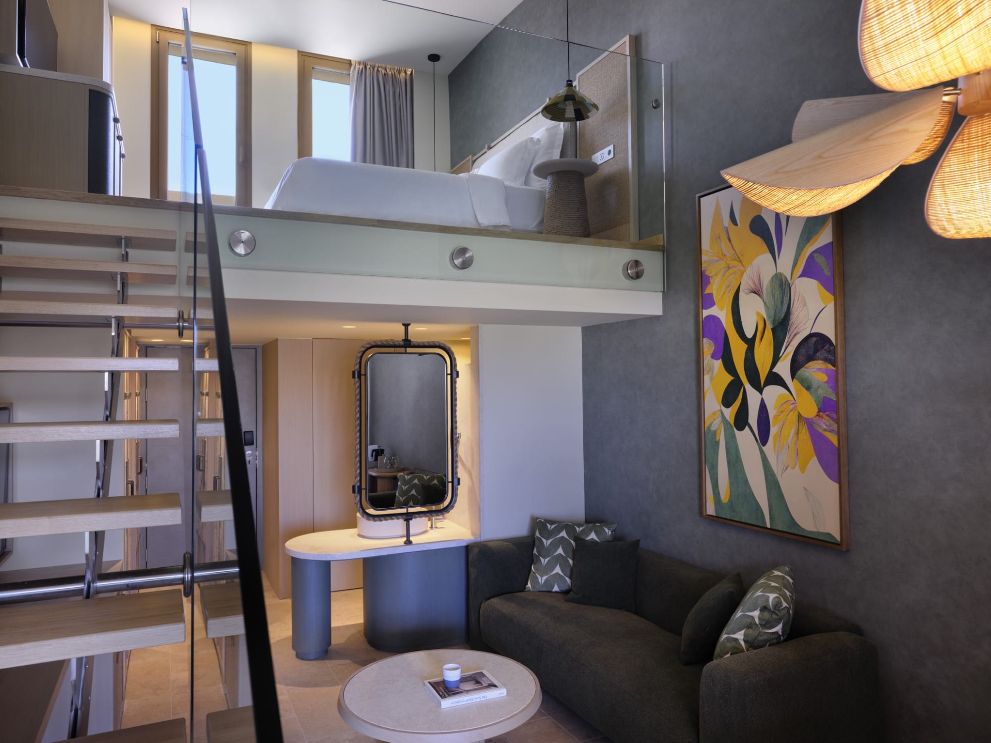 a living room with a tv and couches