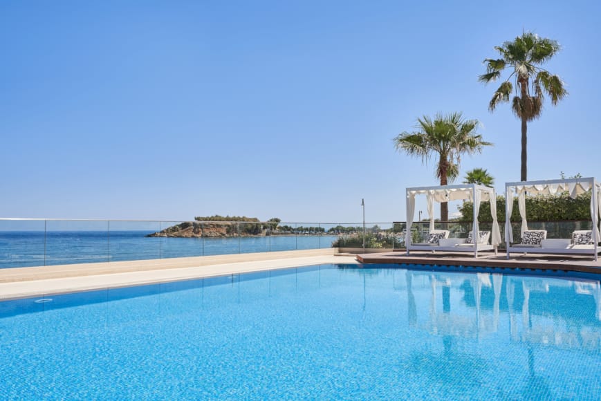 a pool next to a beach